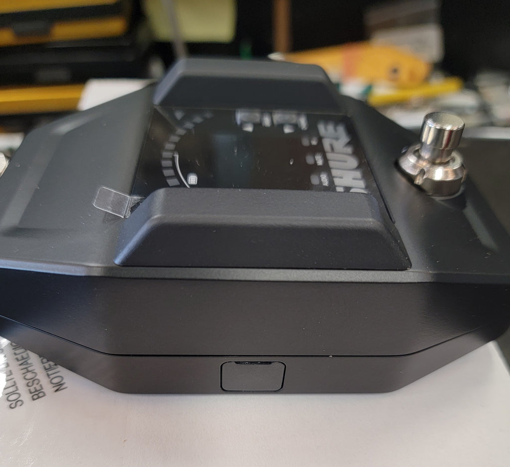 Shure GLXD6+ wireless guitar pedal receiver — bottom panel view