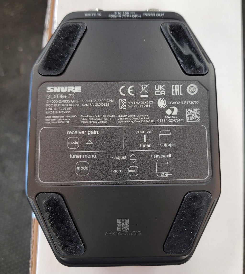 Shure GLXD6+ wireless guitar pedal receiver — angled rear corner view
