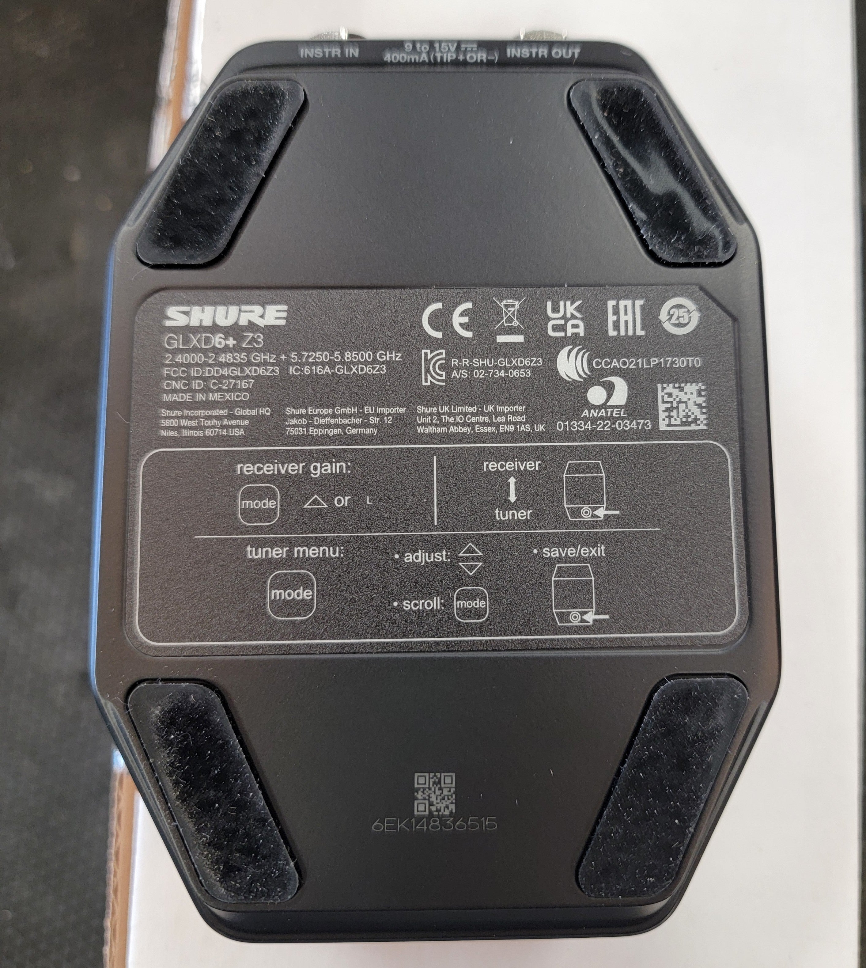 Shure GLXD6+ wireless guitar pedal receiver — angled rear corner view