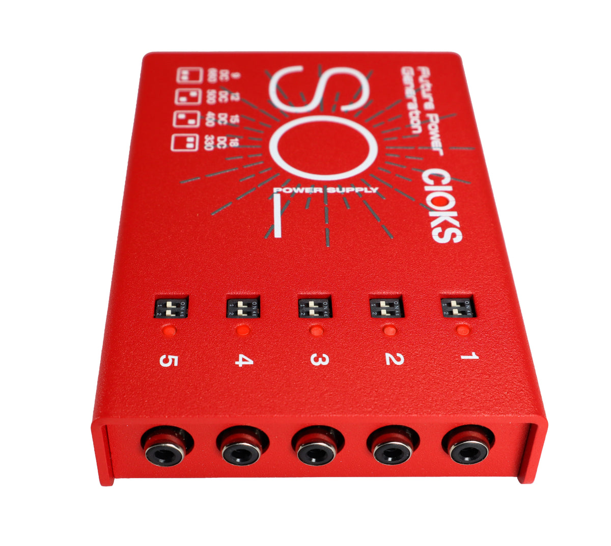 CIOKS SOL pedal power supply — output jacks detail on red enclosure