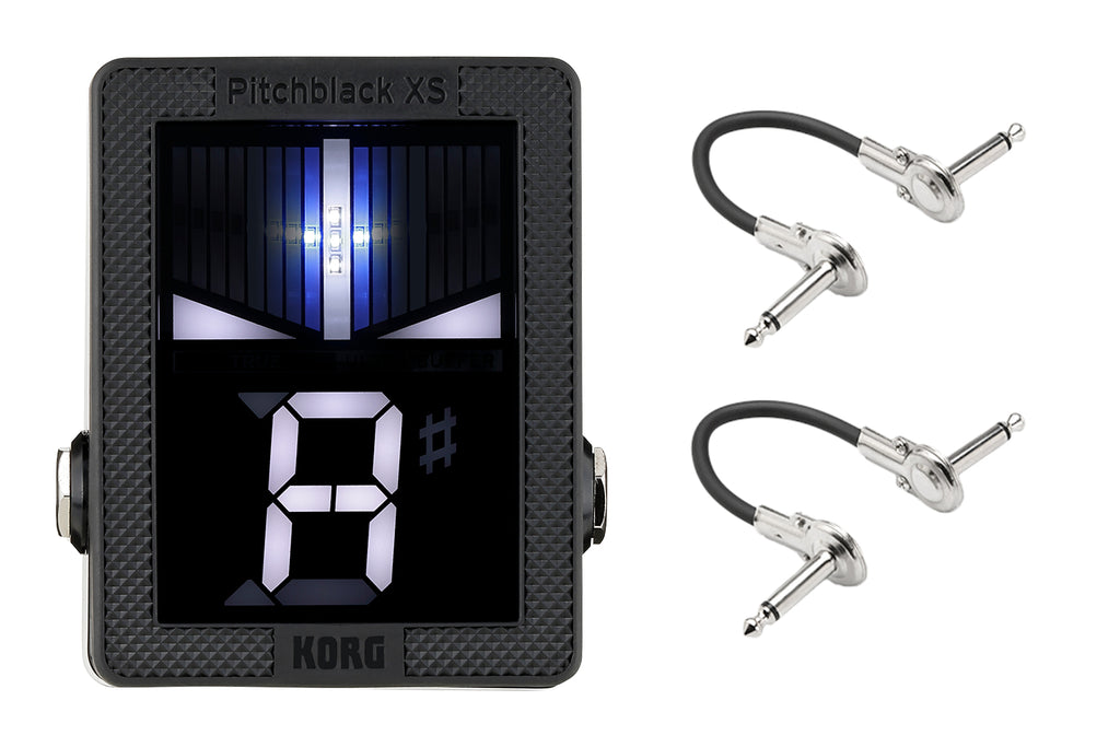 Korg Pitchblack XS mini tuner pedal — black enclosure with two patch cables