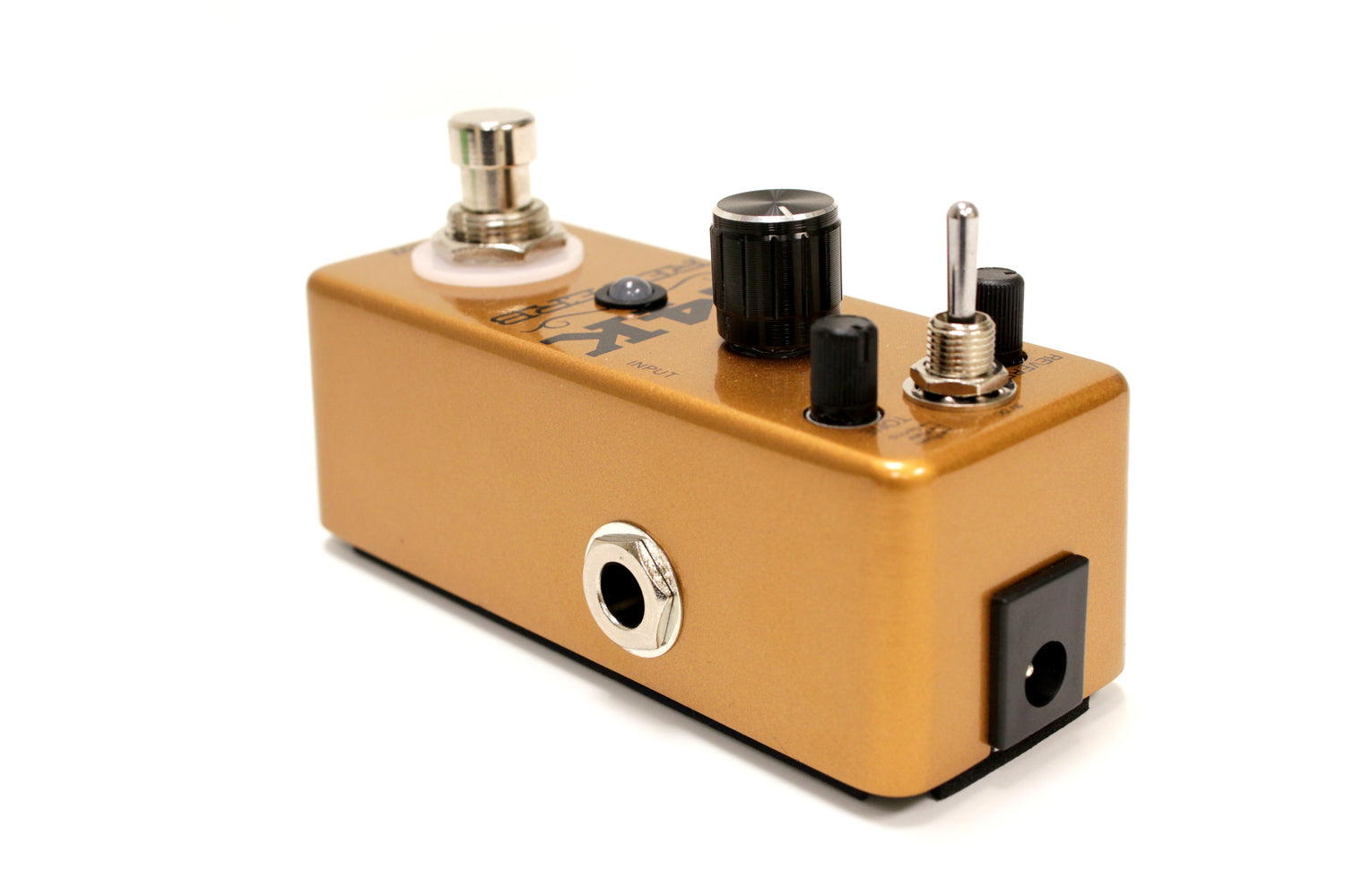 Outlaw Effects 24K Reverb pedal — footswitch and side jack detail