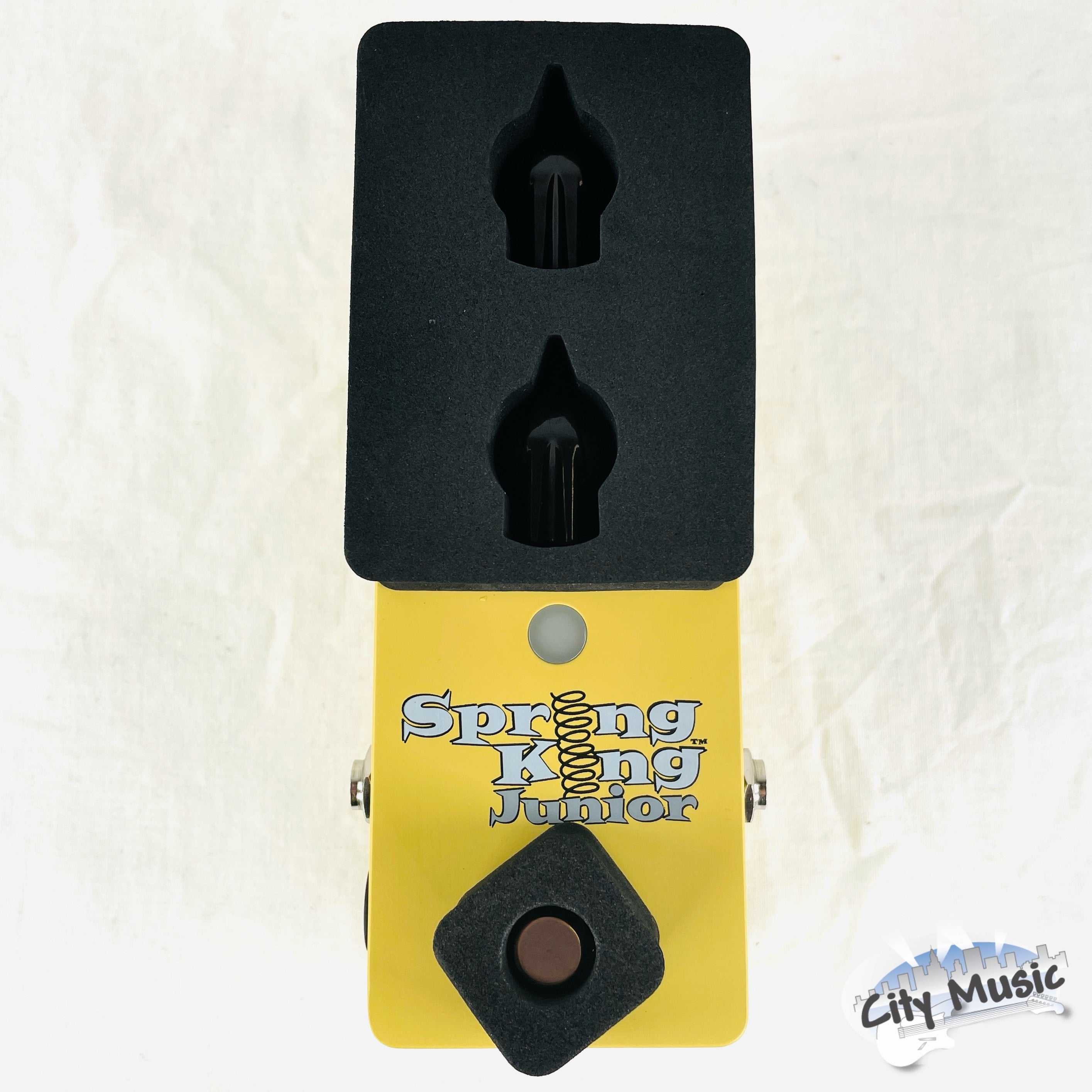 Used Danelectro Spring King Junior yellow reverb pedal — other side view