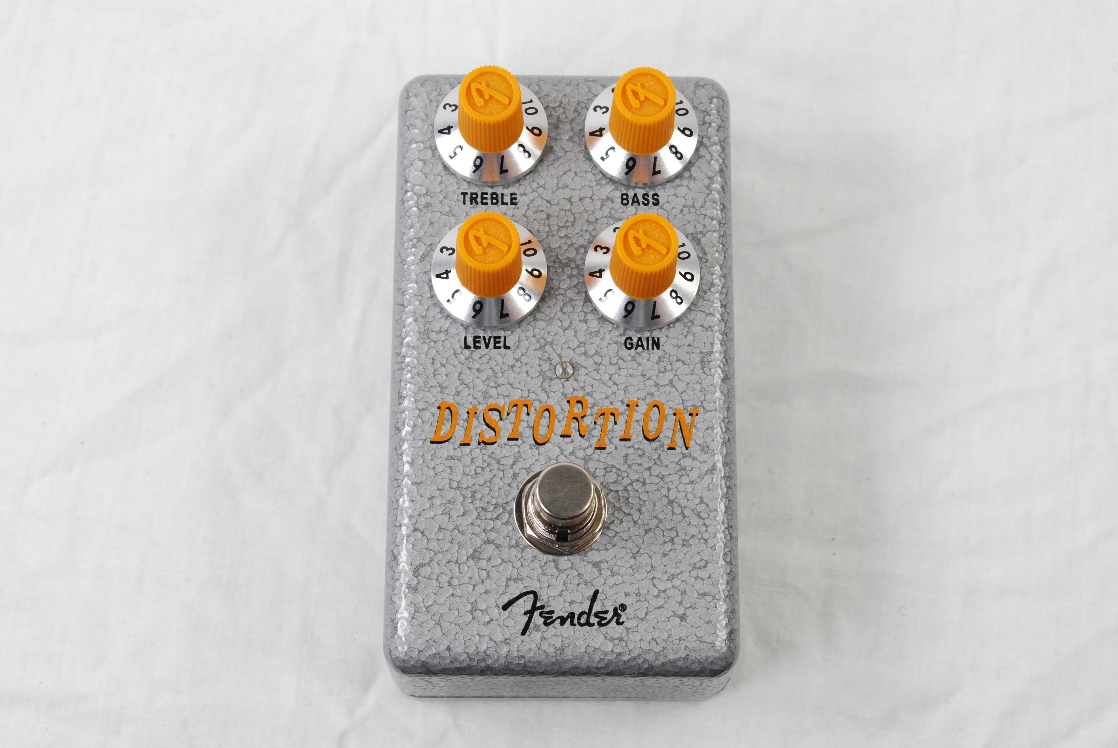 Fender Hammertone Distortion pedal — alternate angle of silver enclosure