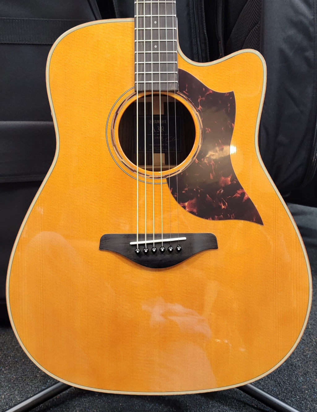 Yamaha A3R acoustic-electric guitar — full front view, Vintage Natural finish