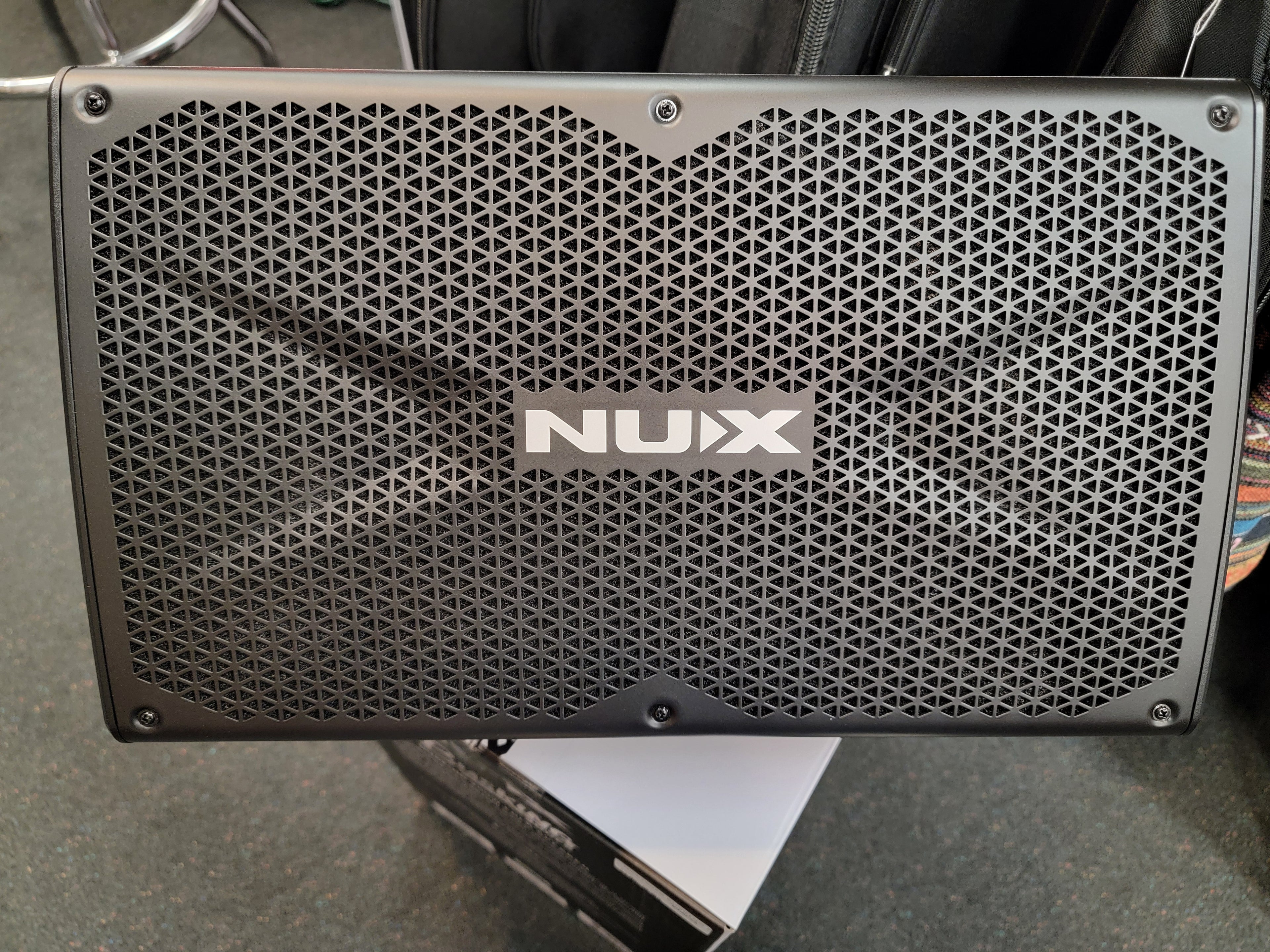 NUX Busking 200FR portable PA speaker — front with NUX logo