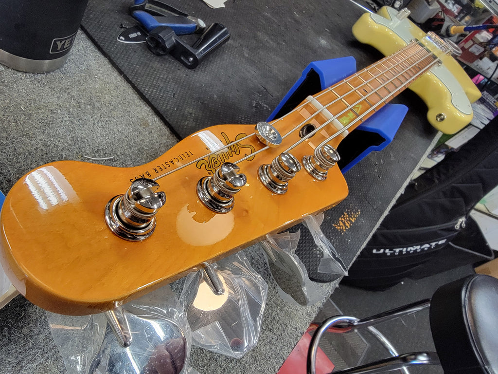 Squier Classic Vibe Telecaster Bass Vintage White — angled view