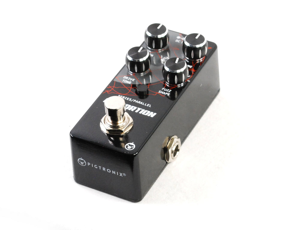 Pigtronix Disnortion overdrive/fuzz — angled side view of black pedal