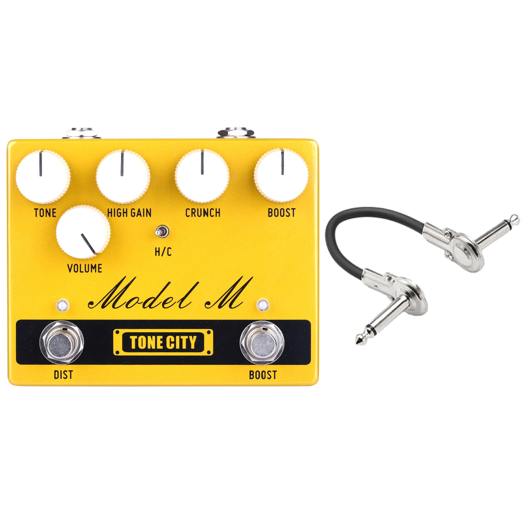 Tone City Model M V2 distortion pedal — top view with patch cable, yellow