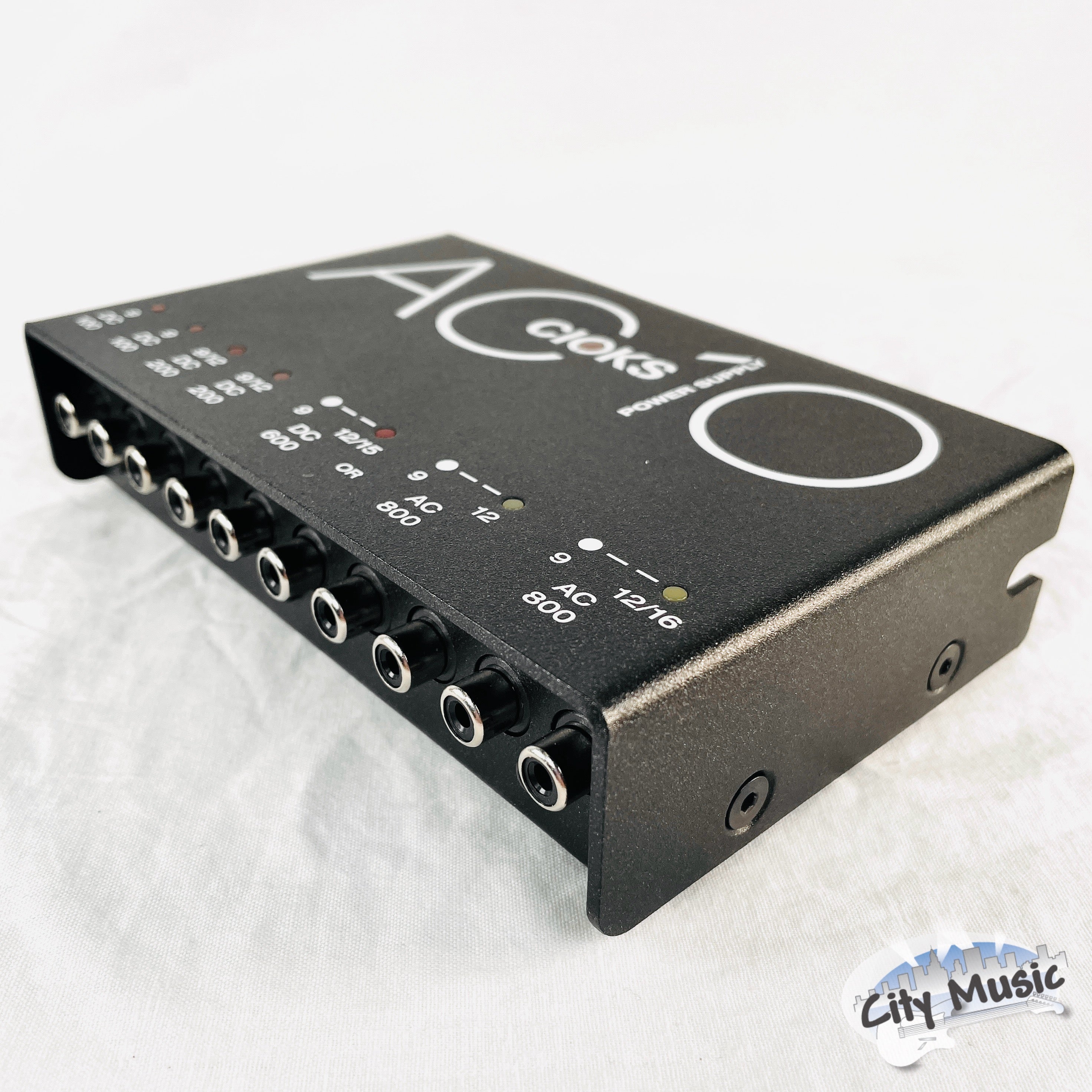 CIOKS AC10 power supply — underside with Pedaltrain mounting hardware