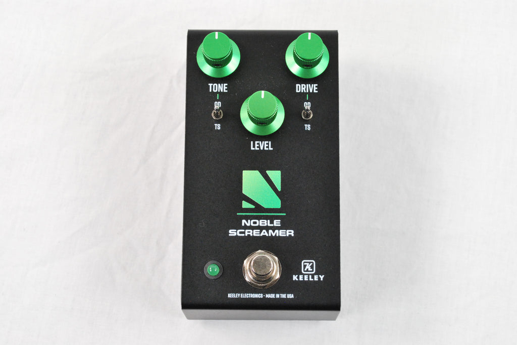 Keeley Noble Screamer overdrive boost pedal — black enclosure with green knobs, top view