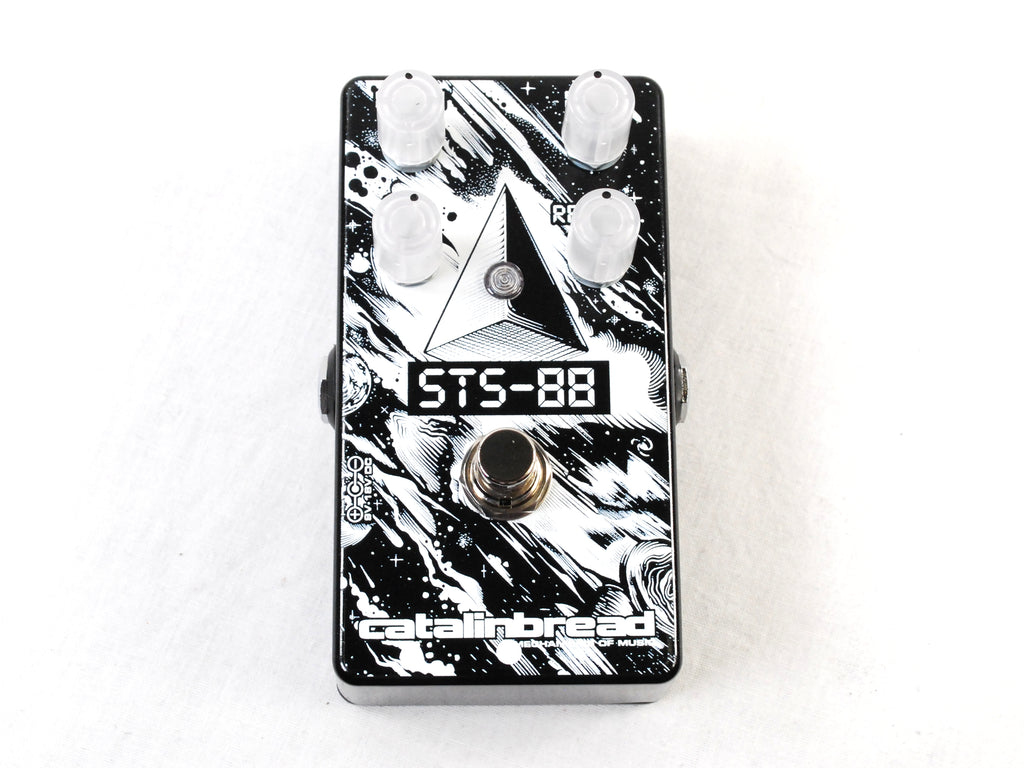 Catalinbread STS-88 pedal — angled view of black and white space graphic enclosure