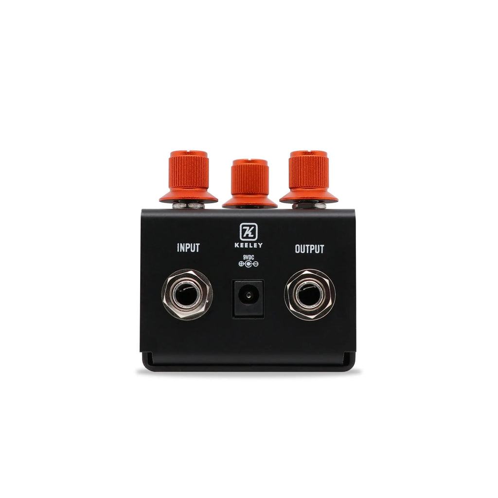 Keeley Angry Orange distortion fuzz pedal — side connection jacks