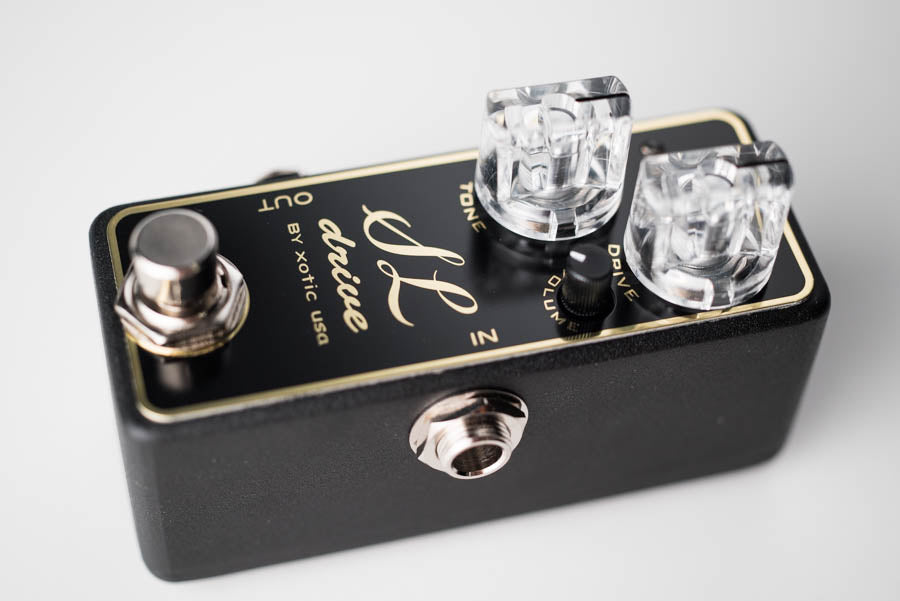 Used Xotic SL Drive overdrive pedal - black housing with gold script lettering
