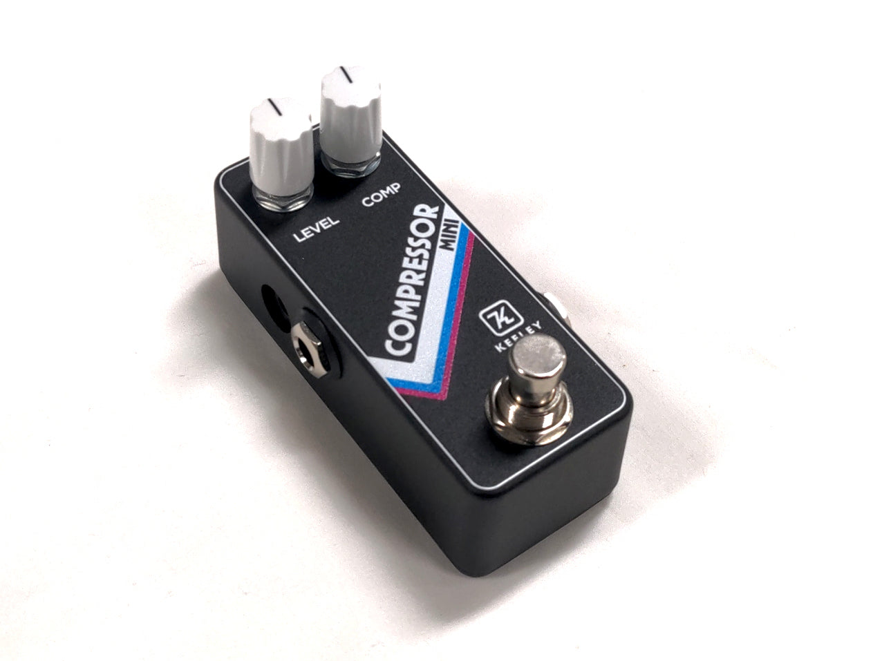 Keeley Compressor Mini compression pedal — side view showing input jack