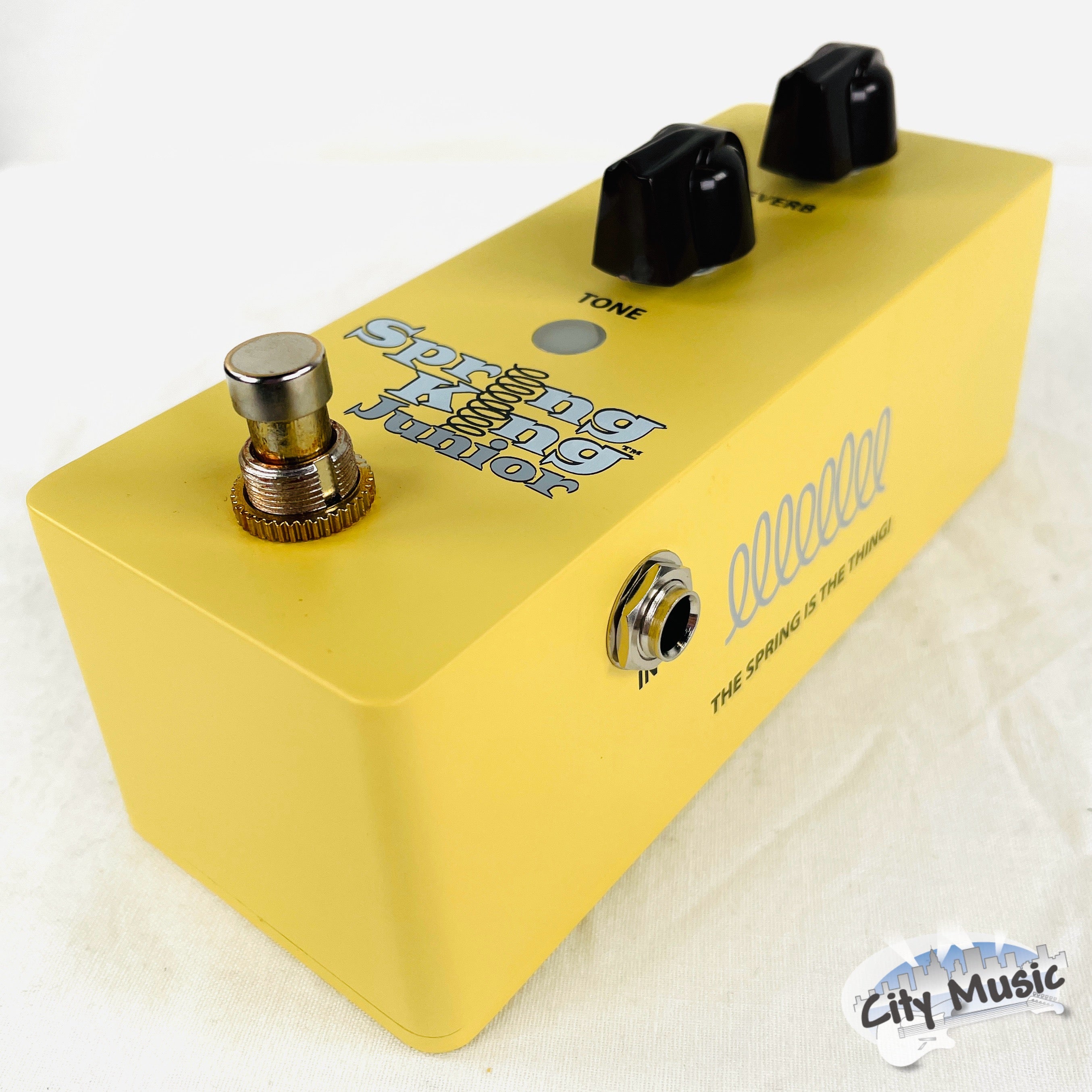 Used Danelectro Spring King Junior yellow reverb pedal — side view