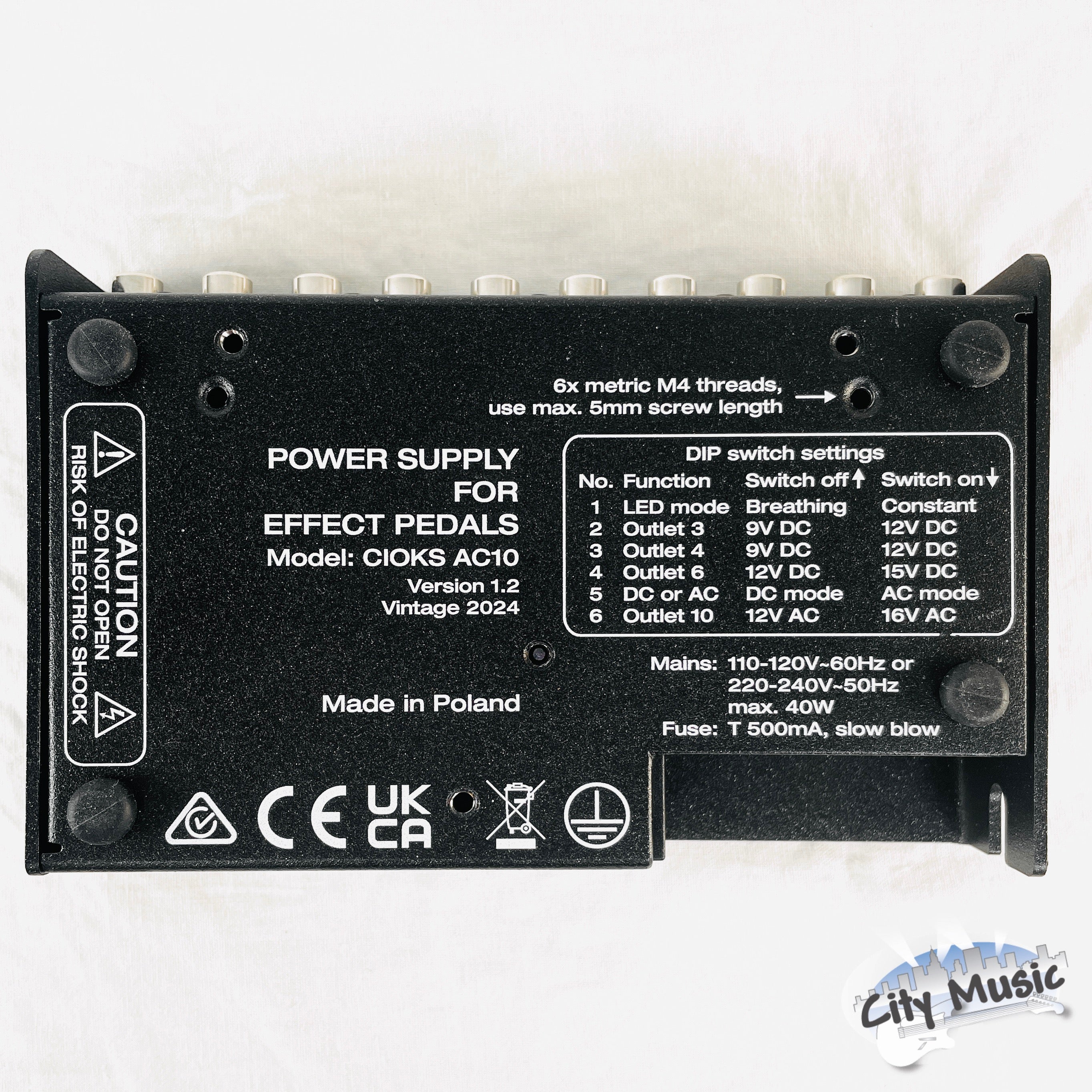 CIOKS AC10 power supply — detail of isolated output sections and labels