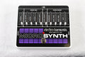Electro-Harmonix Micro Synth analog synth pedal — black and purple top view