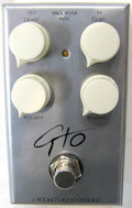 J. Rockett GTO overdrive pedal — silver face with white knobs, top view