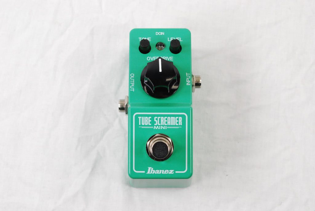 Used Ibanez TS Mini Tube Screamer overdrive pedal - top view of compact green enclosure