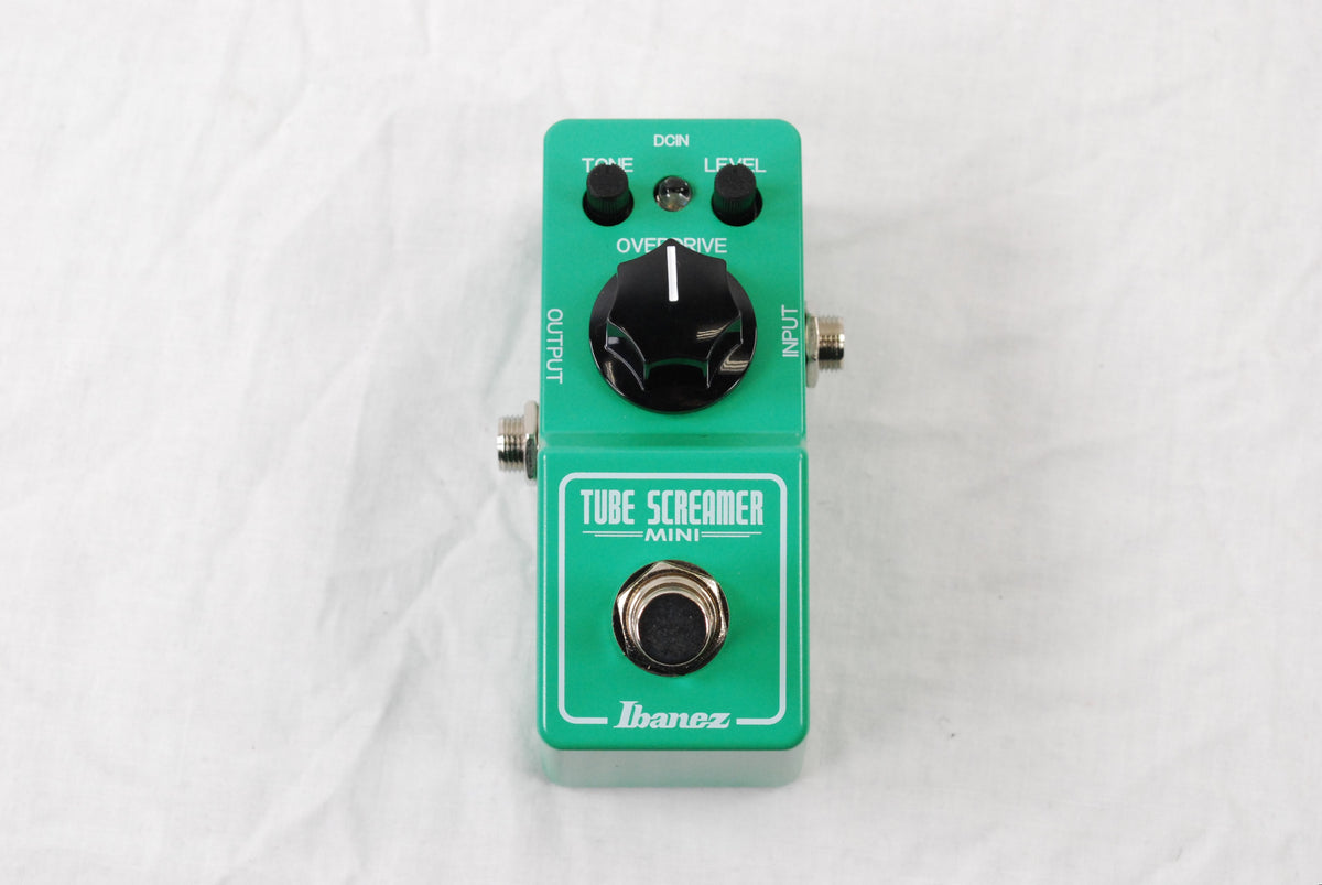 Used Ibanez TS Mini Tube Screamer overdrive pedal - top view of compact green enclosure