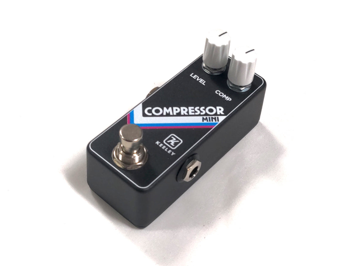 Keeley Compressor Mini compression pedal — opposite side view showing output jack