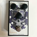 J. Rockett El Hombre overdrive pedal — white face with purple skull graphic, top view