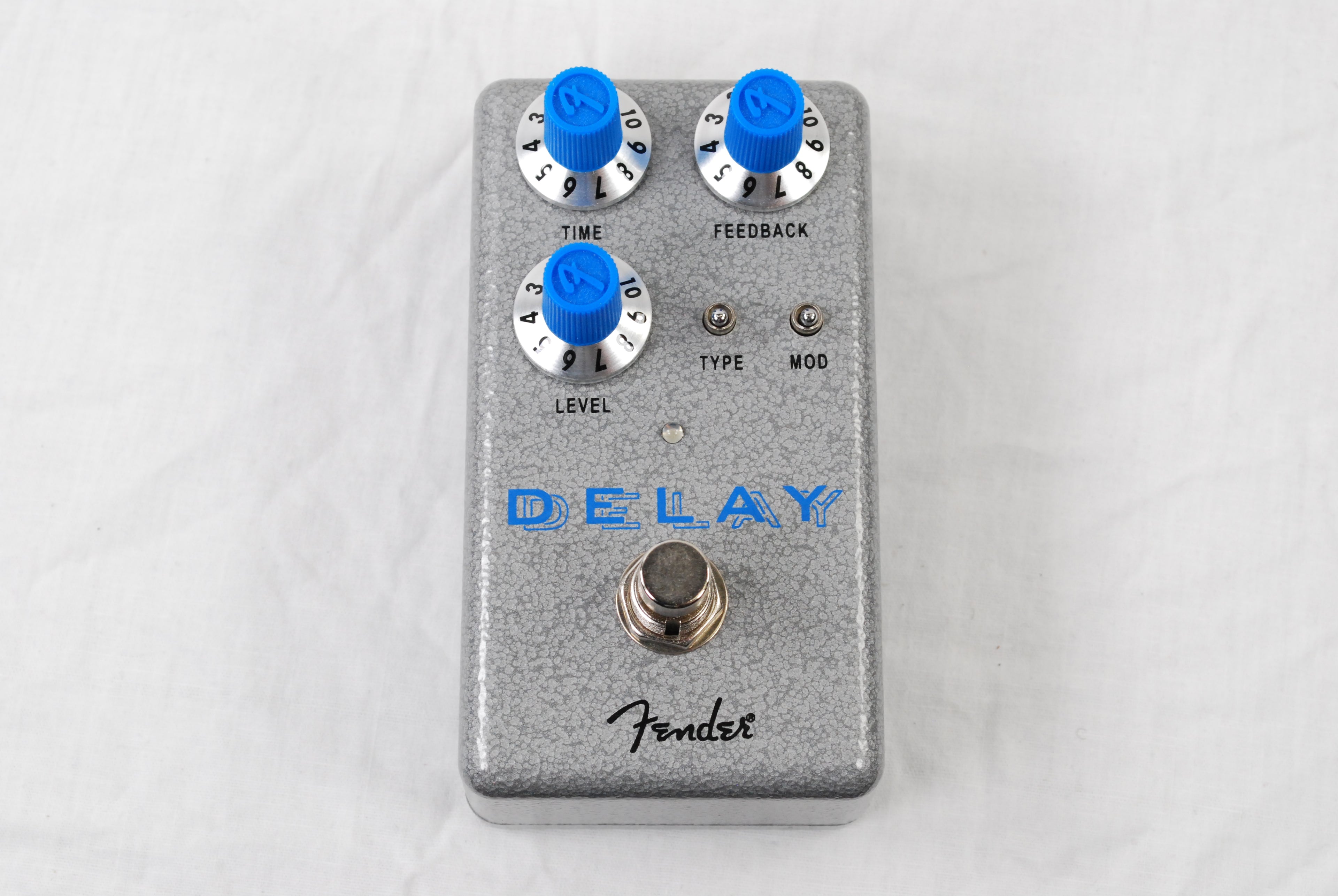 Open Box Fender Hammertone Delay pedal — angled view with blue knobs