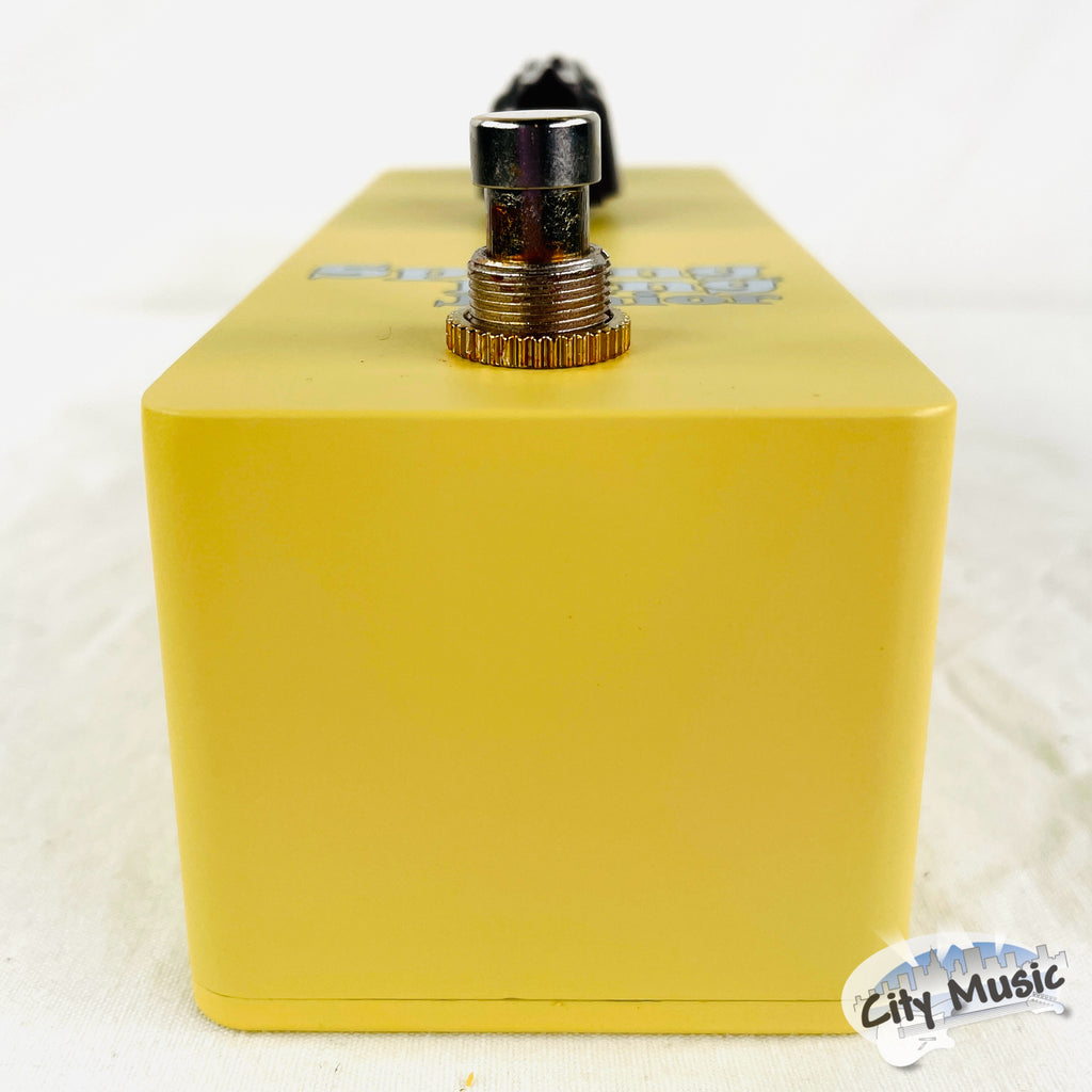 Used Danelectro Spring King Junior yellow reverb pedal — footswitch detail