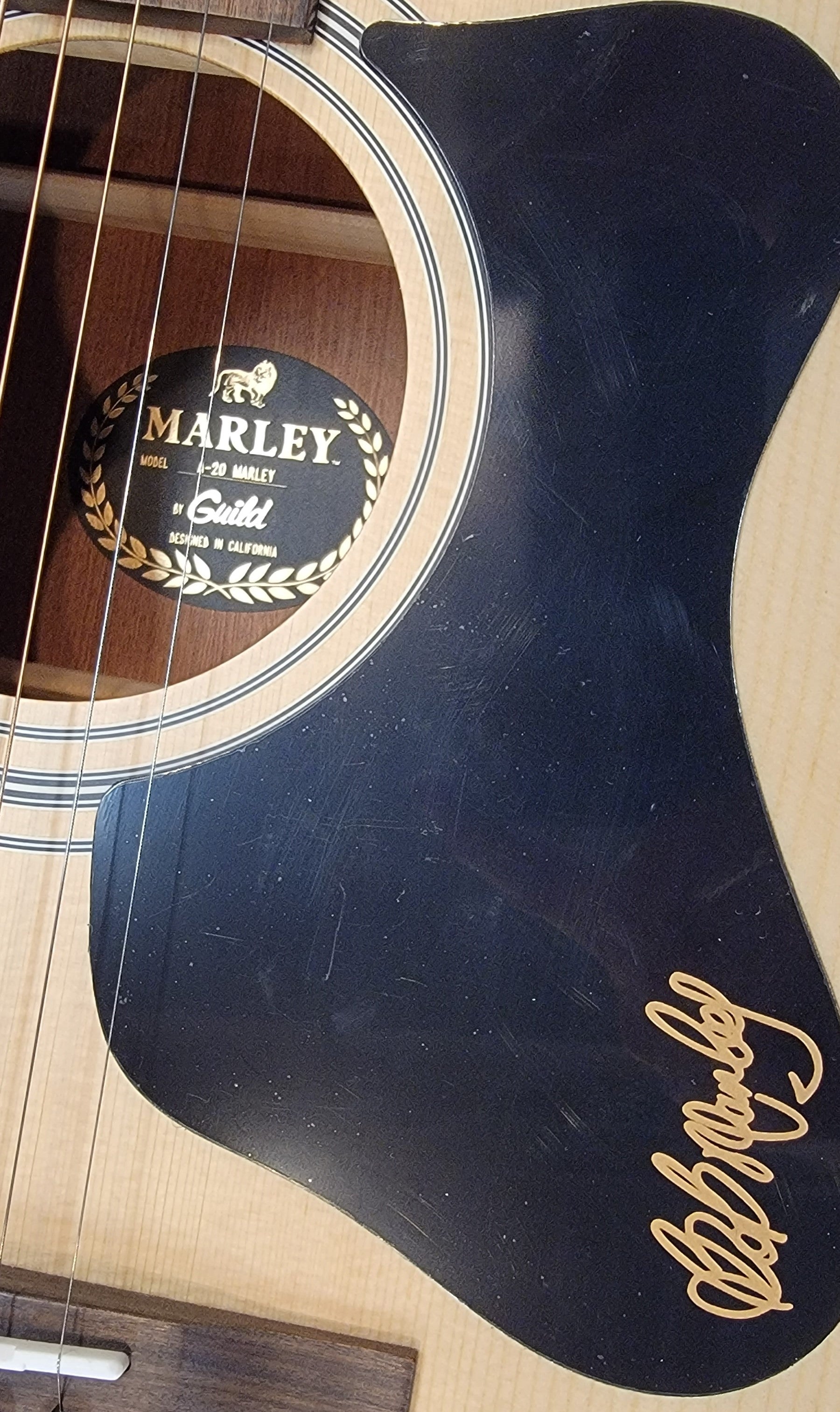 Guild A-20 Bob Marley Acoustic Guitar — bridge and bone saddle detail