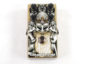 Used Catalinbread Tribute overdrive pedal — gold enclosure with black and white warrior artwork, top view