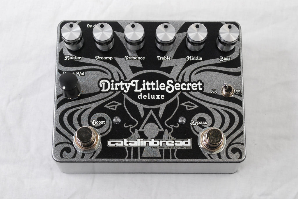 Catalinbread Dirty Little Secret Deluxe overdrive pedal — silver enclosure, top view with six knobs