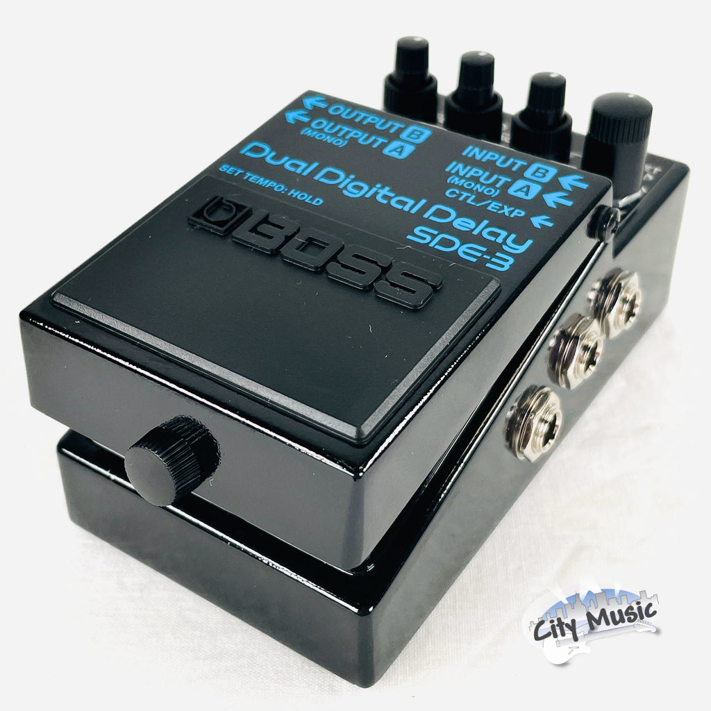 Boss SDE-3 Dual Digital Delay pedal — black enclosure angled view