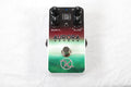 Keeley Aurora Reverb pedal — aurora green and red enclosure, top view with Warmth and Blend knobs