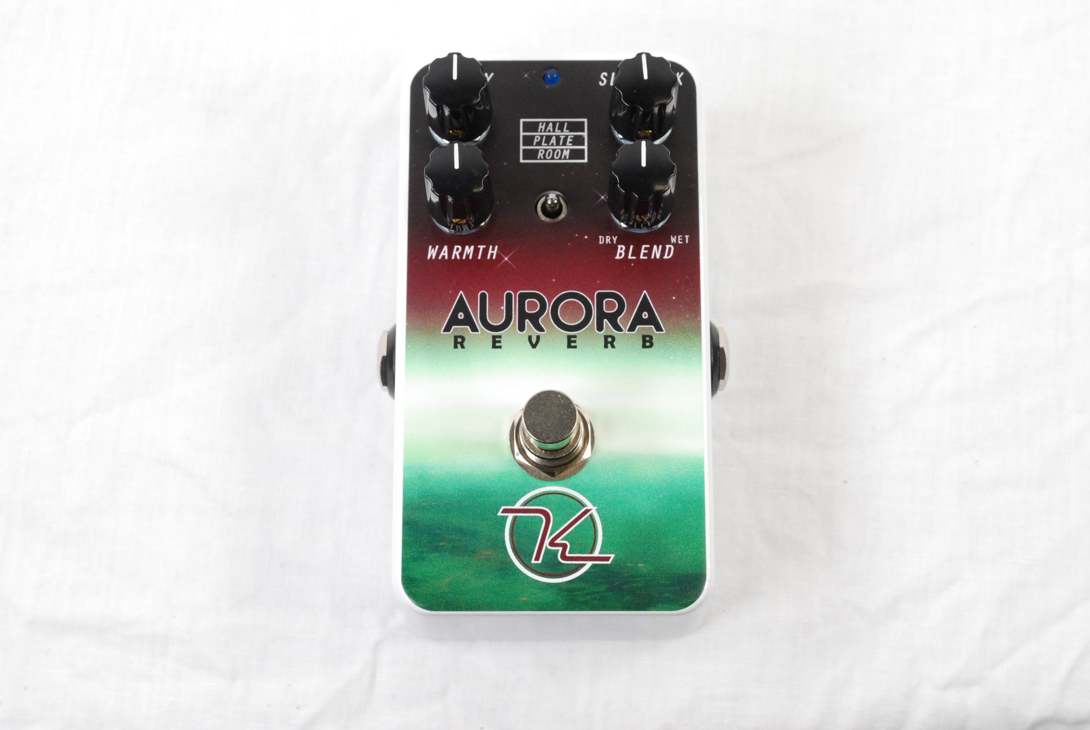Keeley Aurora Reverb pedal — aurora green and red enclosure, alternate top angle