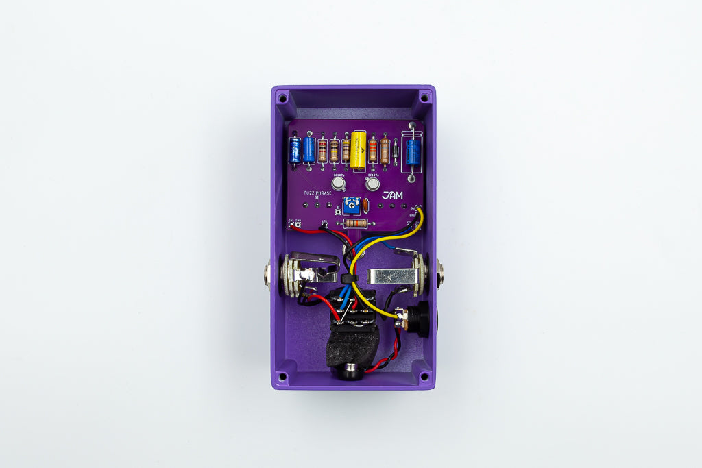 JAM Pedals Fuzz Phrase Si purple silicon fuzz pedal — side jack view