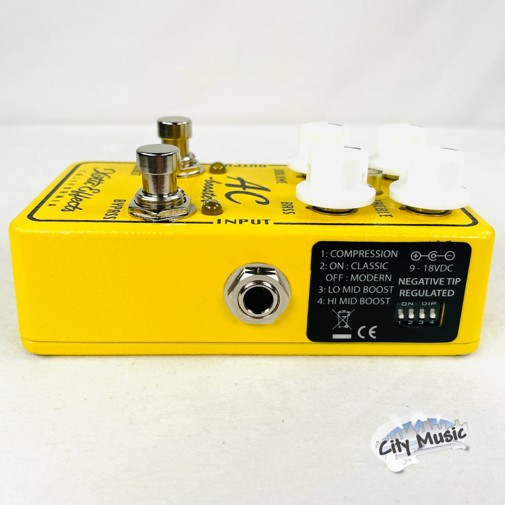 Xotic AC Booster V2 pedal — yellow, dip switch detail