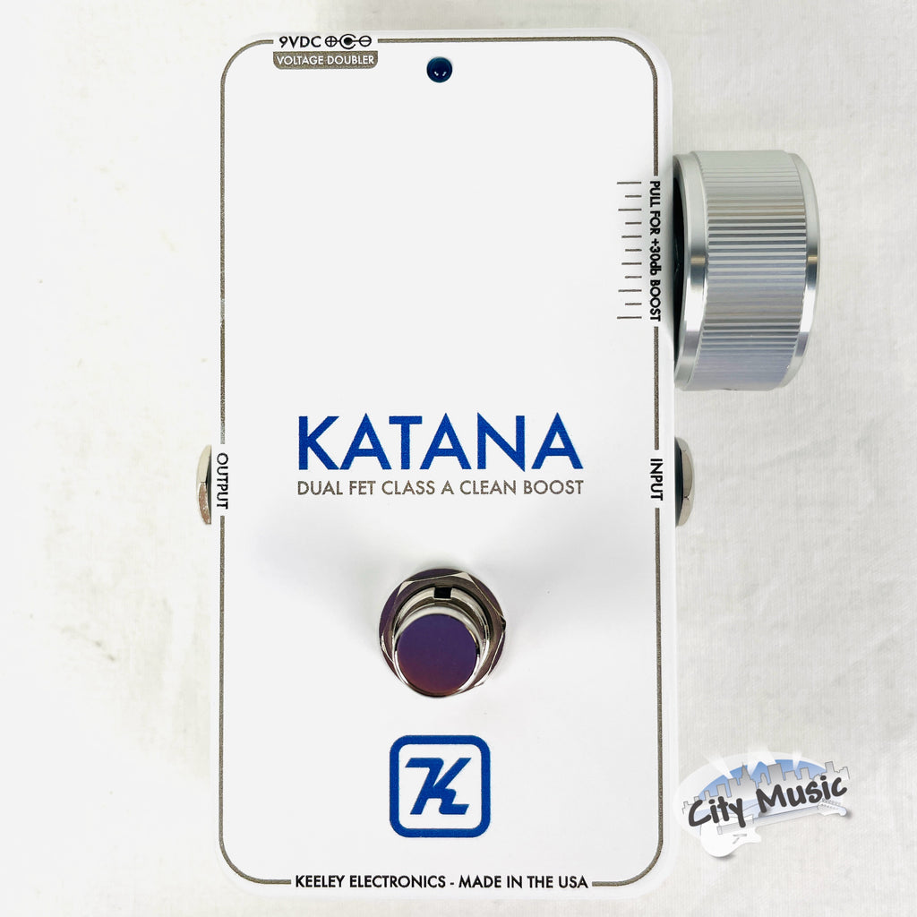 Keeley Katana Clean Boost pedal — white Throwback enclosure top view with volume knob