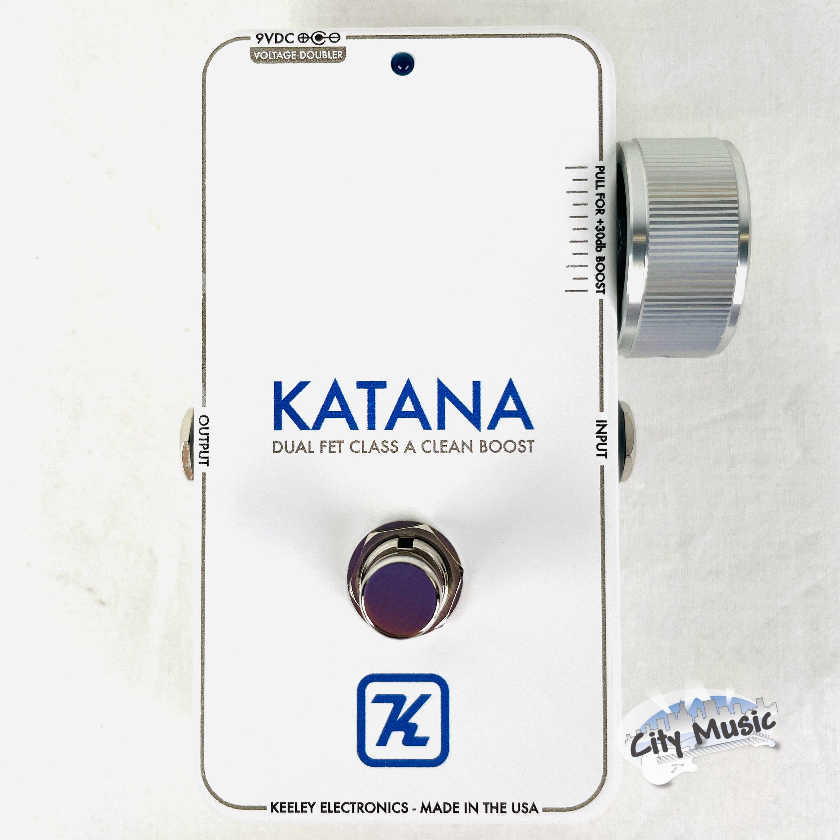 Keeley Katana Clean Boost pedal — white Throwback enclosure top view with volume knob