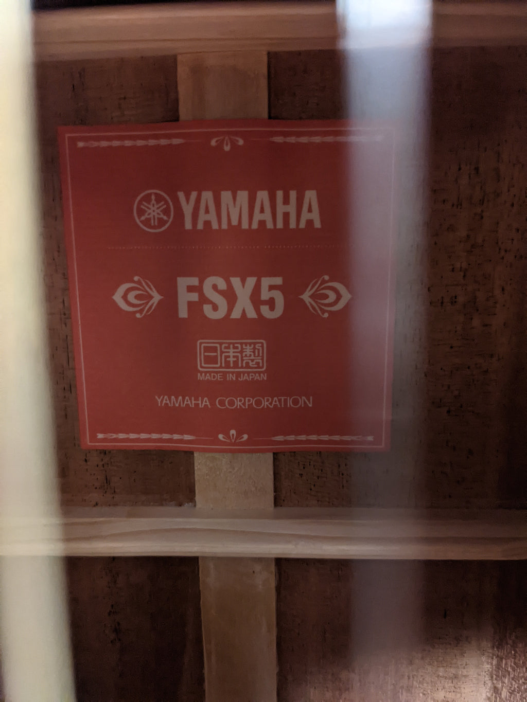 Yamaha Red Label FSX5 acoustic-electric guitar — mahogany back view