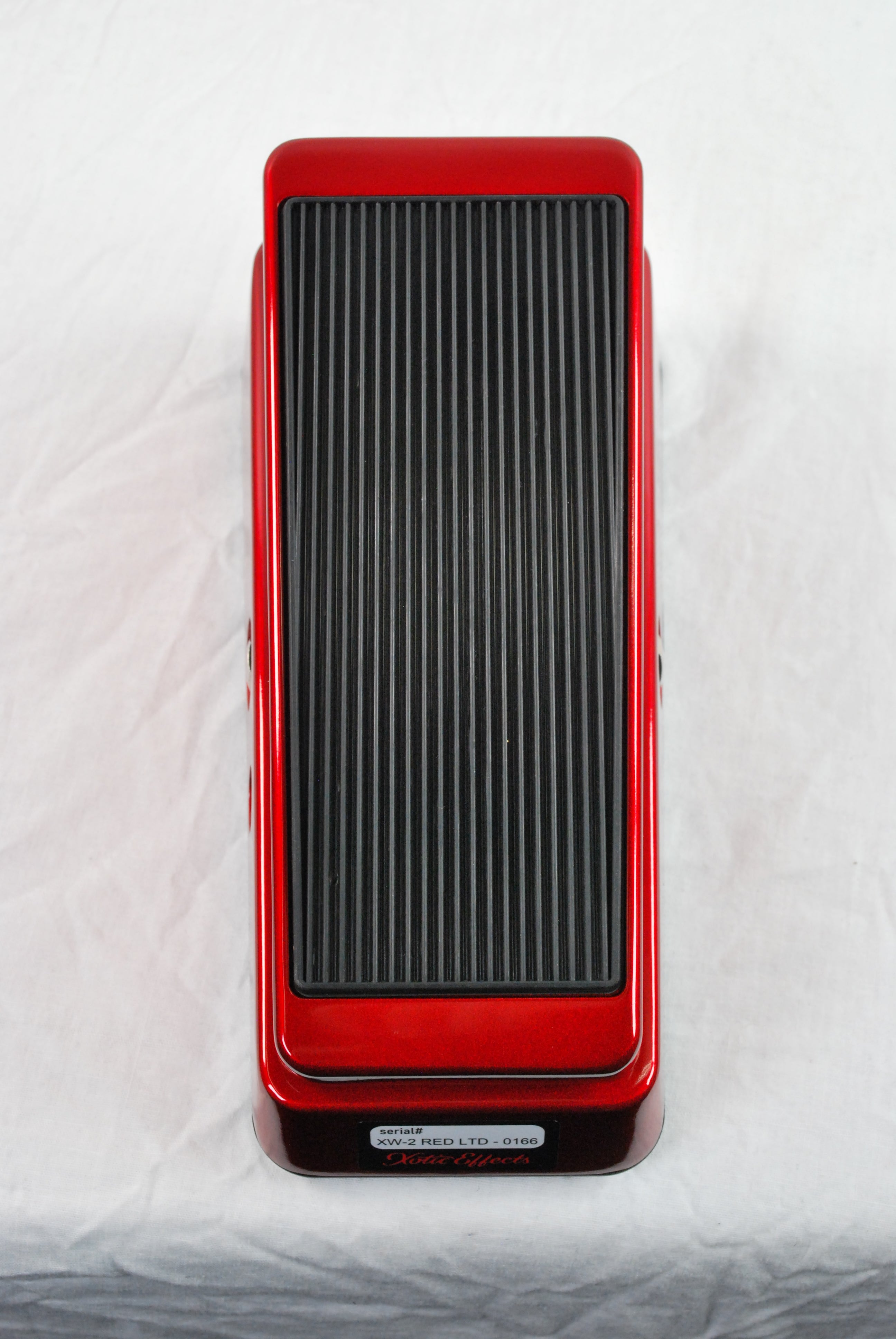 Xotic XW-2 Wah Candy Apple Red used mint — top-down view showing serial number
