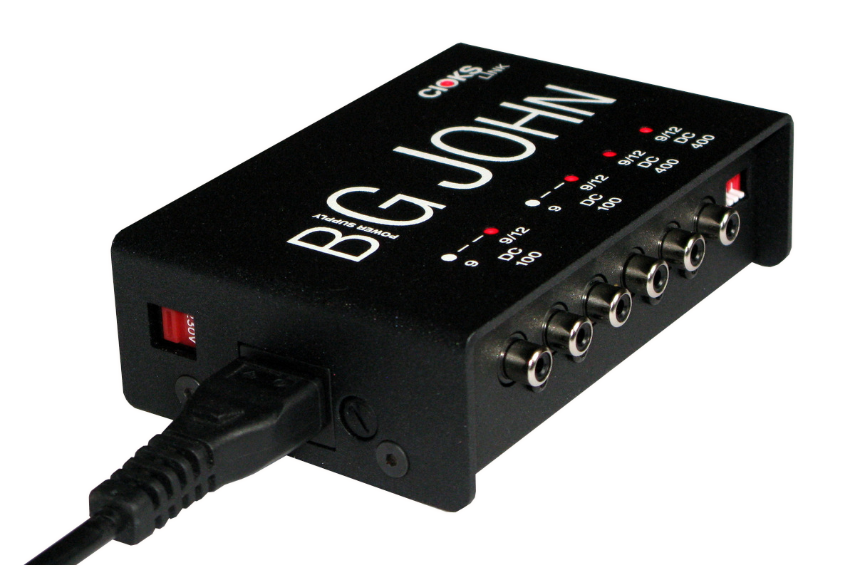 CIOKS Big John Link power supply showing outlet voltage and current labels