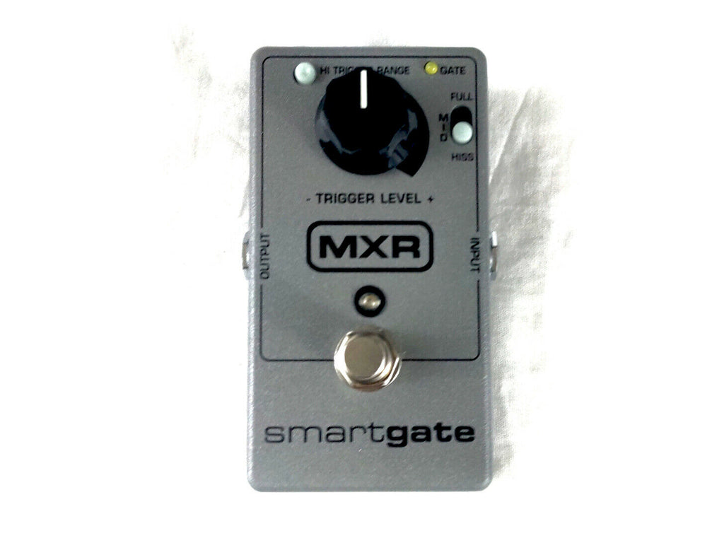 MXR M135 Smart Gate noise gate pedal — silver enclosure, top view with Trigger Level knob
