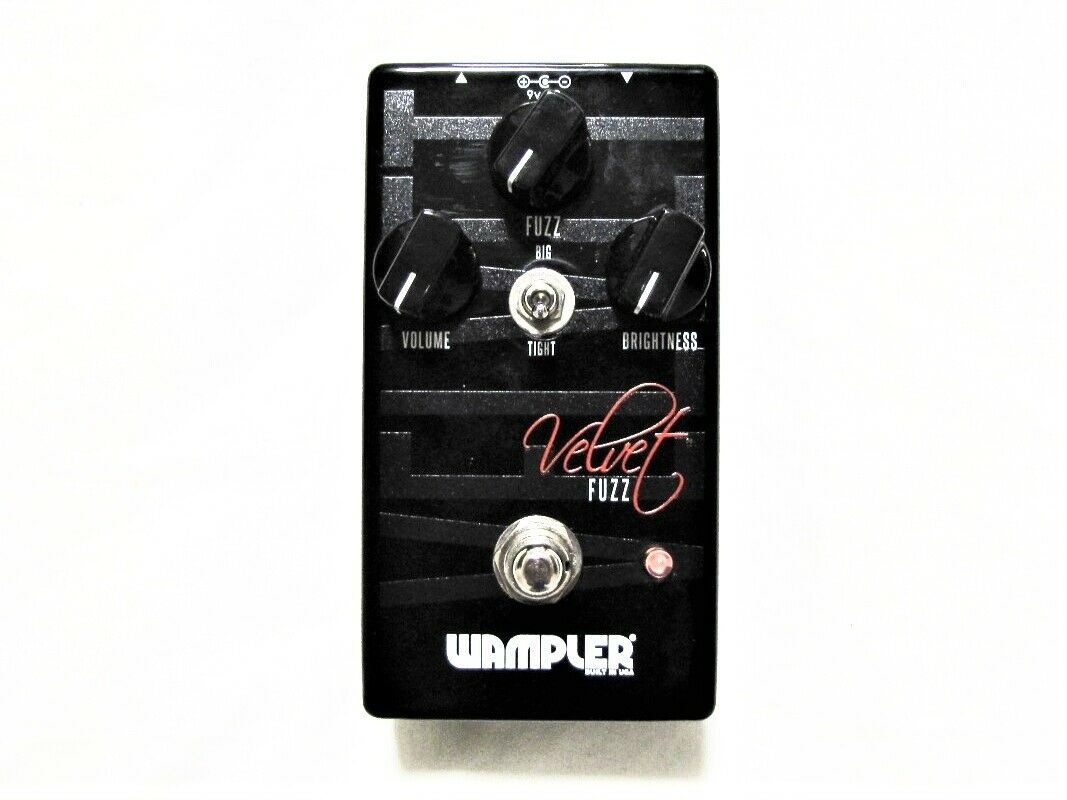Used Wampler Velvet Fuzz black guitar effects pedal, top view with Volume, Fuzz and Brightness knobs