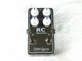 Used Xotic RC Booster V2 boost pedal — dark silver enclosure front view, mint condition