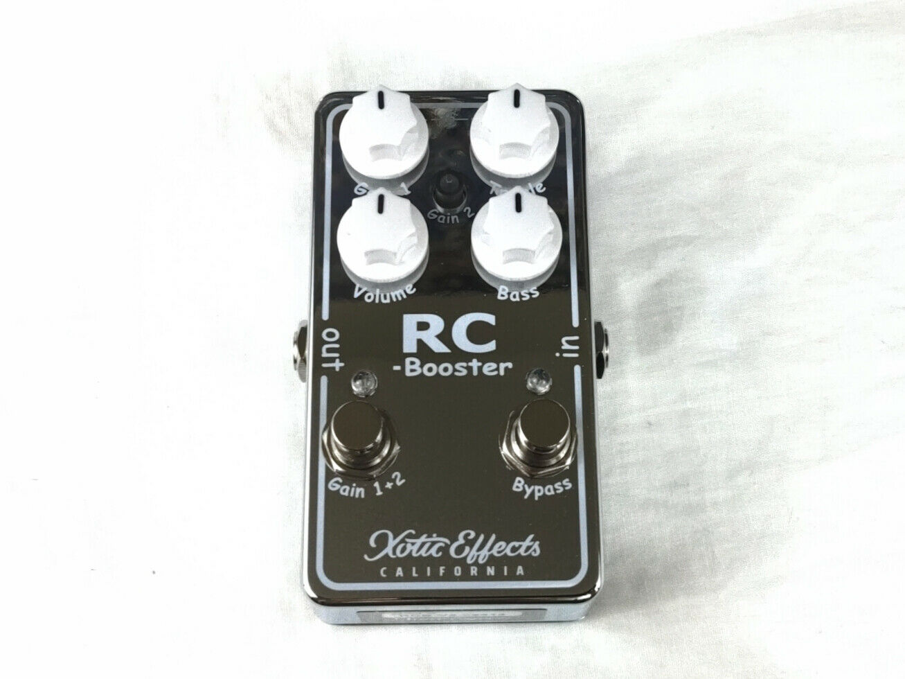 Used Xotic RC Booster V2 boost pedal — dark silver enclosure front view, mint condition