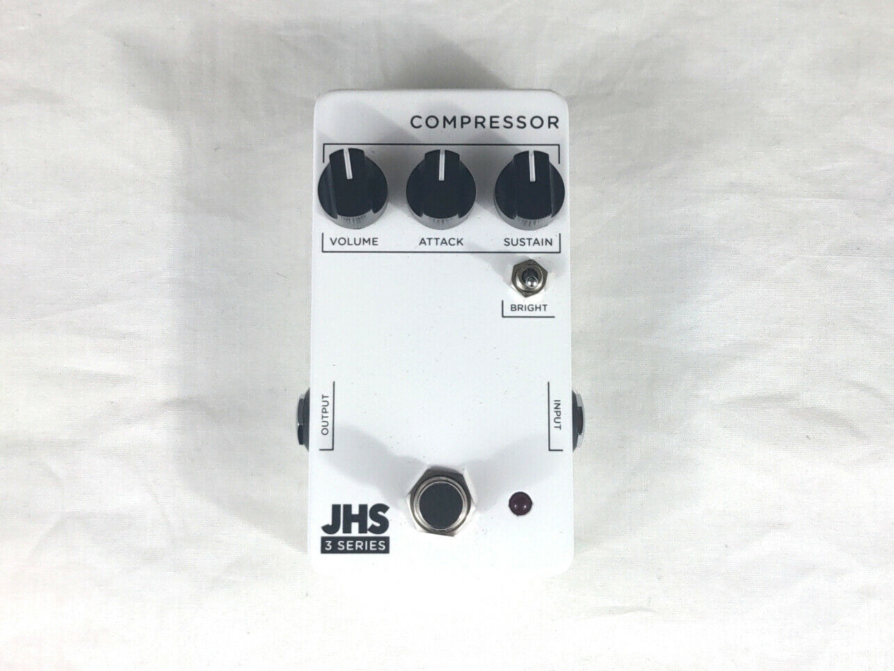 JHS 3 Series Compressor pedal - white enclosure, top view with Volume Attack Sustain knobs