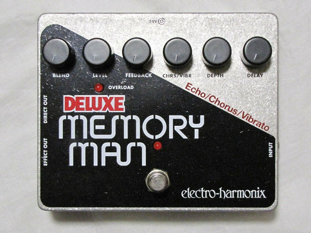 Electro-Harmonix Deluxe Memory Man analog delay pedal — top view, silver and black