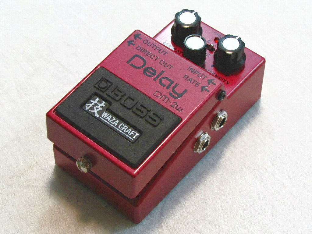Used Boss DM-2W analog delay pedal, red, angled side view