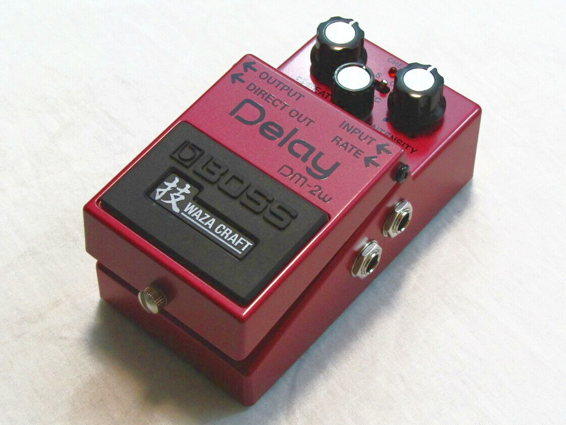 Used Boss DM-2W analog delay pedal, red, angled side view